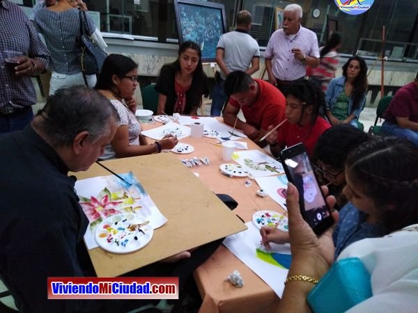 Joel Ramos en el Dia Munidal Pintor Boca y Pie